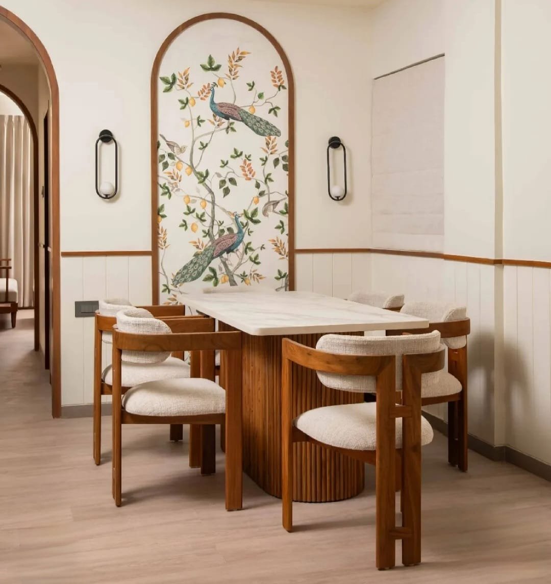 Custom dining space with peacock accent wall and bespoke table - Furniture Perinthalmanna showroom